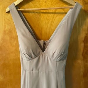 Taupe gosh. Formal. Bridesmaid or wedding guest. Tie back. Floor length.